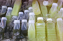 picture of bottles of different flavor of juice on ice